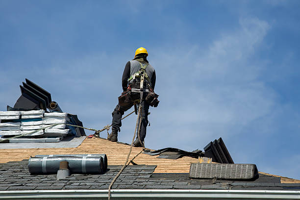 Professional Roofing technician working in Guilford, NY